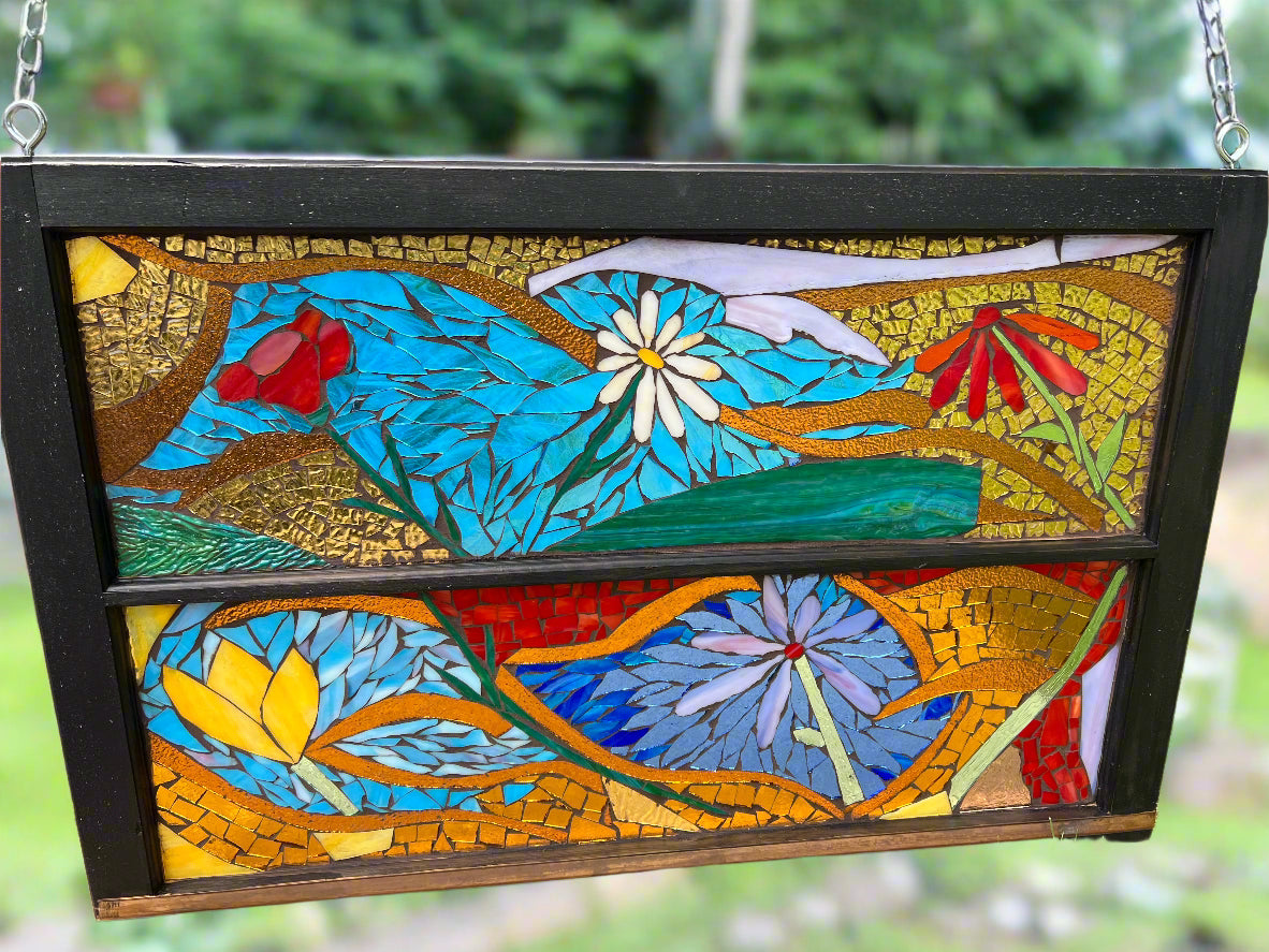 Mosaic artwork in a black frame. Lake Geneva Art Studio