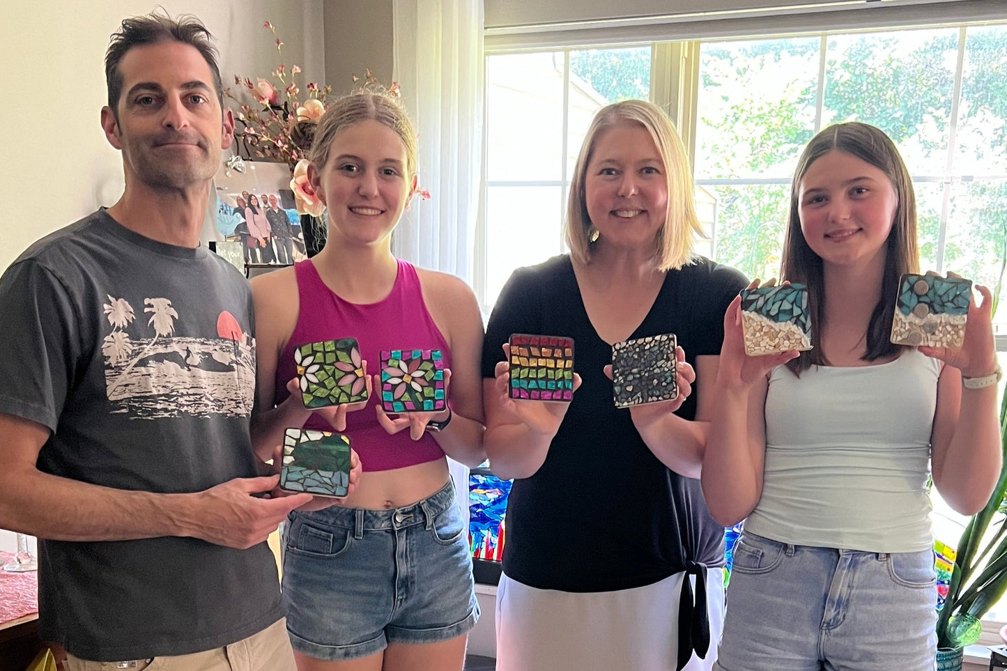 Mosaic Class Students posting with their creations. Lake Geneva Art Studio